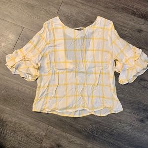 White and yellow gingham blouse